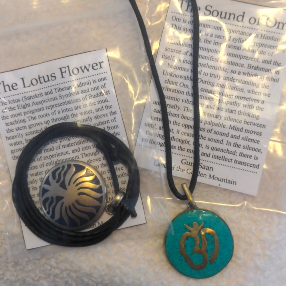 2 Piece Lotus Flower/ Om Pendants on Adjustable Leather Cords.